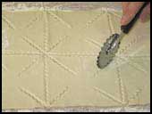 Cortamos en cruz sin llegar al centro Cortamos en cruz sin llegar al centro